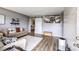 Cozy living room featuring a modern design, hardwood floors and a sliding barn door at 1355 Ash Ct, Martinsville, IN 46151