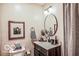 Charming powder room with a modern vanity and tasteful decor at 1355 Ash Ct, Martinsville, IN 46151