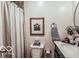 Charming powder room with a modern vanity and tasteful decor at 1355 Ash Ct, Martinsville, IN 46151