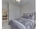This bedroom is nicely appointed with carpet and double closet doors at 1395 Heron Ridge Blvd, Greenwood, IN 46143