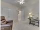 Office with recliner, desk with sewing machine, double closet doors, and ceiling fan at 1395 Heron Ridge Blvd, Greenwood, IN 46143