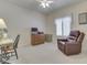 Office space with desk, printer, chair, filing cabinet, and recliner at 1395 Heron Ridge Blvd, Greenwood, IN 46143
