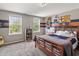 Bedroom featuring themed decor and double windows providing lots of natural light at 15936 Symphony Blvd, Noblesville, IN 46060