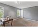 Bedroom with neutral walls, carpet flooring, and plenty of natural light from the windows at 15936 Symphony Blvd, Noblesville, IN 46060