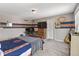 Bedroom features a TV, themed decor, and double windows providing lots of natural light at 15936 Symphony Blvd, Noblesville, IN 46060