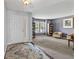 Living room with an open entryway, plush carpet, large windows, and plenty of seating at 15936 Symphony Blvd, Noblesville, IN 46060