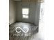Bright living room with wood-look floors, ready to welcome new occupants with warmth and comfort at 1602 E Minnesota St, Indianapolis, IN 46203