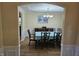 Elegant dining room with chandelier and natural light at 1605 Fox Dr, Martinsville, IN 46151