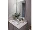 Bathroom features a white vanity with a modern sink, large mirror, and neutral wall color at 17364 Graley Pl, Westfield, IN 46074