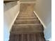 Staircase features carpeted steps and a solid, neutral-colored railing at 17364 Graley Pl, Westfield, IN 46074