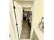 Walk-in closet with built-in shelving and rod system at 214 Handley St, Indianapolis, IN 46222