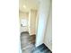 Bright entryway featuring wood-look floors, a white door, and neutral wall colors that create an inviting space at 214 Handley St, Indianapolis, IN 46222