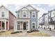 Charming two-story home with covered porch and stone accents on the facade at 214 Handley St, Indianapolis, IN 46222