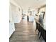 Modern, eat-in kitchen boasts a central island, stainless appliances, and an open floor plan at 214 Handley St, Indianapolis, IN 46222