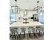 Bright, open kitchen with a large island, white cabinets, and stainless steel appliances at 214 Handley St, Indianapolis, IN 46222
