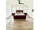 Spacious main bedroom with tray ceilings, ceiling fan and ensuite bath at 214 Handley St, Indianapolis, IN 46222