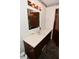 Bathroom with traditional vanity, lighting fixture, and mirror at 2220 Radcliffe Ave, Indianapolis, IN 46227