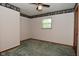 Bedroom featuring carpeted floors, a ceiling fan, and natural light at 2220 Radcliffe Ave, Indianapolis, IN 46227