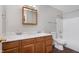 Bathroom with double vanity, medicine cabinet, and shower-tub combination at 308 Creekstone Ct, Indianapolis, IN 46239