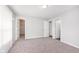 Bedroom featuring neutral walls, carpet, and plenty of closet space at 308 Creekstone Ct, Indianapolis, IN 46239
