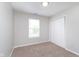 Bedroom with neutral walls, carpet, large window and closet at 308 Creekstone Ct, Indianapolis, IN 46239