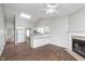 Spacious open-concept living area with kitchen, fireplace, and modern flooring at 308 Creekstone Ct, Indianapolis, IN 46239