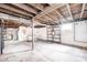 Unfinished basement with exposed beams allows for customization and storage space at 333 N Jefferson St, Brownsburg, IN 46112
