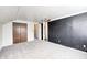 Spacious bedroom with carpet flooring, fan, and closet offers a comfortable retreat at 333 N Jefferson St, Brownsburg, IN 46112