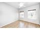 Bedroom featuring hardwood floors, a ceiling fan, and bright natural lighting at 333 N Jefferson St, Brownsburg, IN 46112