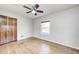 Bedroom featuring hardwood floors, neutral walls, and a closet at 333 N Jefferson St, Brownsburg, IN 46112