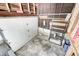 Garage with shelving provides ample storage and workspace at 333 N Jefferson St, Brownsburg, IN 46112