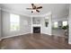 Bright living room with a fireplace and multiple windows, creating an inviting and airy atmosphere at 3546 Golden Gate N Dr, Carmel, IN 46074