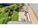 A backyard patio and garden featuring outdoor furniture at 3601 Lakeshore Ct, Greenwood, IN 46143