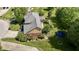 Aerial view of a backyard with a trampoline, garden, and a fire pit at 3601 Lakeshore Ct, Greenwood, IN 46143