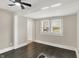 Bedroom featuring black vinyl flooring and large window for ample light at 364 Congress Ave, Indianapolis, IN 46208