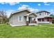 Charming home with a gray exterior, covered front porch, and well-maintained lawn, creating a welcoming curb appeal at 364 Congress Ave, Indianapolis, IN 46208