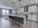 Well-equipped kitchen with stainless steel appliances, ample counter space, and view to the dining room at 3697 Chalmers Dr, Bargersville, IN 46106