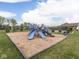 Community playground with colorful play structures and a mulch ground for enjoyment at 3697 Chalmers Dr, Bargersville, IN 46106