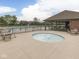 Community pool area with a hot tub and plenty of seating, perfect for relaxation and socializing at 3697 Chalmers Dr, Bargersville, IN 46106