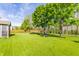 Expansive backyard featuring mature trees, well maintained lawn and an enclosed porch at 3808 Brigade Cir, Carmel, IN 46032