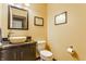 Stylish powder room featuring a vessel sink, granite countertop, and modern fixtures at 3808 Brigade Cir, Carmel, IN 46032