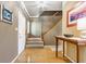 Welcoming entryway featuring hardwood floors, staircase, and stylish decor at 3808 Brigade Cir, Carmel, IN 46032