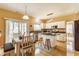 Bright eat-in kitchen with stainless steel appliances, center island, and sliding door to the backyard at 3808 Brigade Cir, Carmel, IN 46032