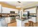 Well-equipped kitchen with stainless steel appliances, breakfast bar, and ample counter space at 3808 Brigade Cir, Carmel, IN 46032