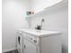Practical laundry room with washer, dryer, and shelf, designed for efficient chore management at 3808 Brigade Cir, Carmel, IN 46032