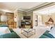 Comfortable living room featuring plush seating, a media center, and an open layout at 3808 Brigade Cir, Carmel, IN 46032