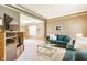 Cozy living room with a view of the dining area, ample seating, and a modern aesthetic at 3808 Brigade Cir, Carmel, IN 46032