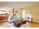 Comfortable living room featuring a neutral color palette and an open floor plan to the kitchen at 3808 Brigade Cir, Carmel, IN 46032