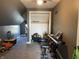 This attic bonus space features sloped ceilings, carpet, and plenty of natural light at 40 N Park Ave, Martinsville, IN 46151