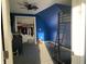 This blue bedroom features a bunk bed, open closet space and carpet at 40 N Park Ave, Martinsville, IN 46151